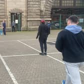 The cricketers passing the time at Dover with an impromptu match (Photo: SWNS)